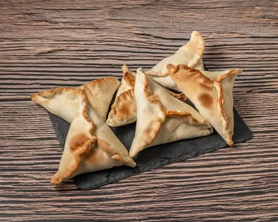 Delicious Spinach Filled Pastry at Tarboosh Market in Edmonton, AB